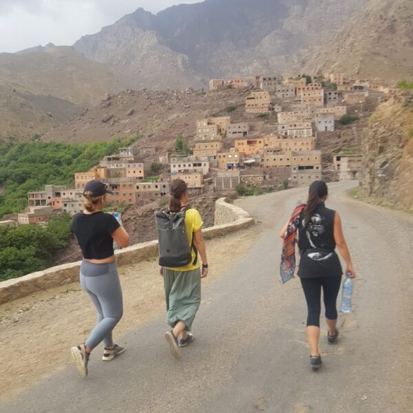 travelers in the high atlas mountains village of imlil near Marrakech